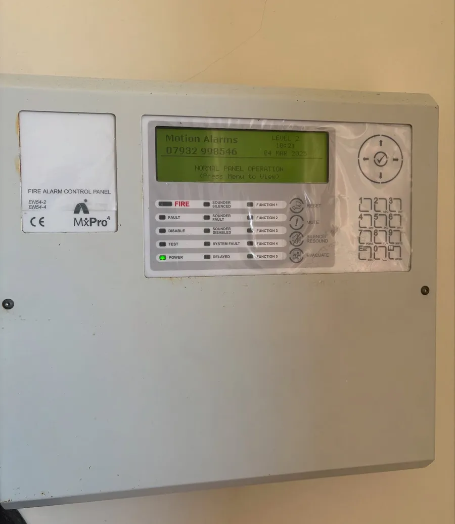 Fire alarm control panel installed on a wall