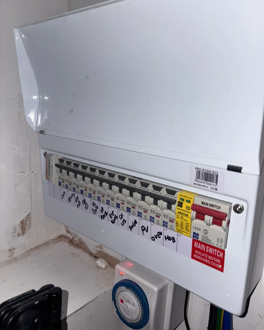 Modern consumer unit with labelled circuits and test stickers