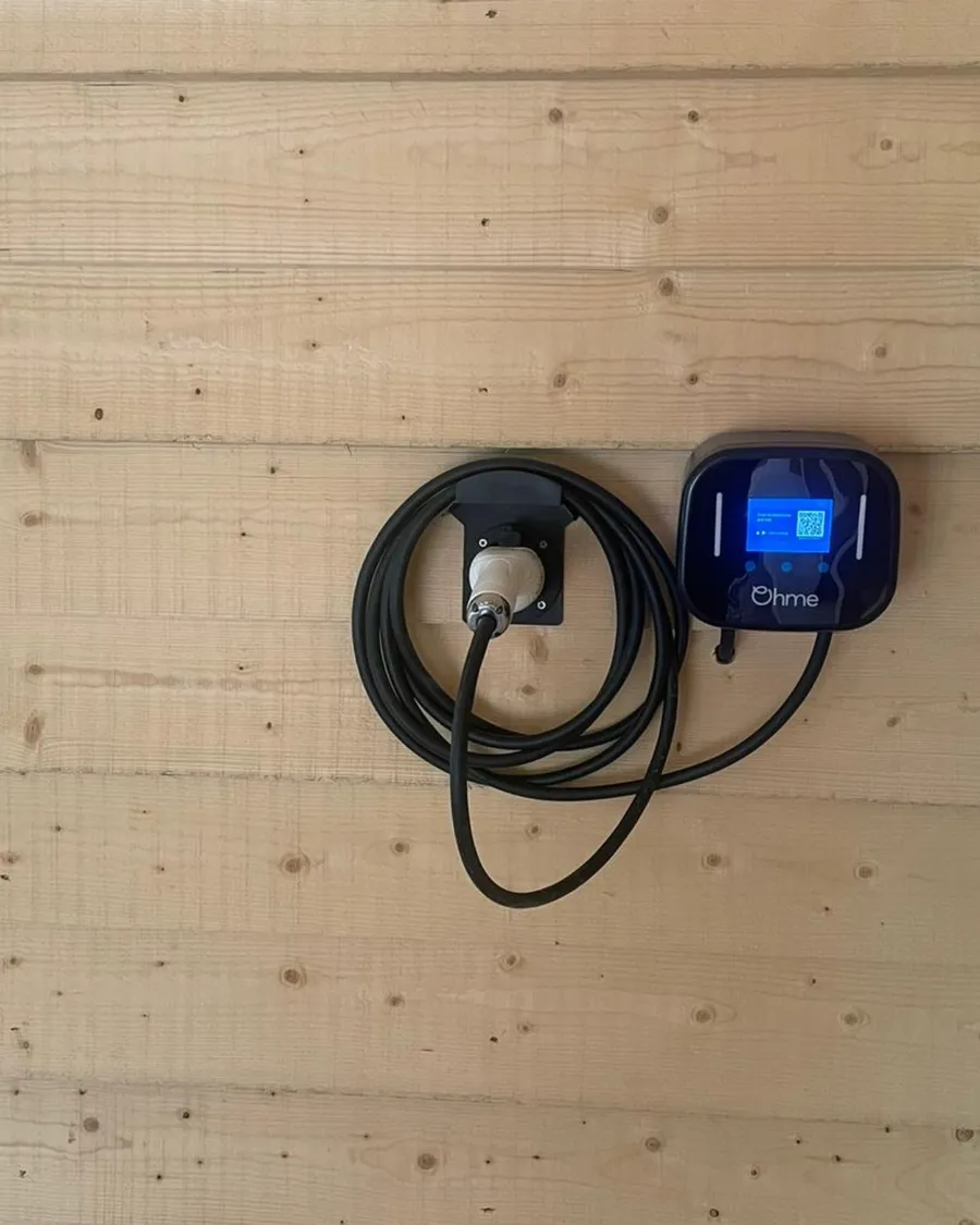 Wallbox charger mounted on timber fencing