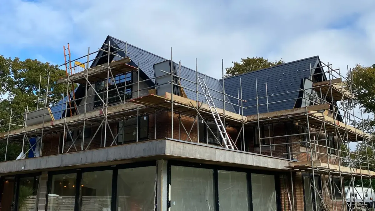 In-roof solar array on a new build house with scaffolding still up