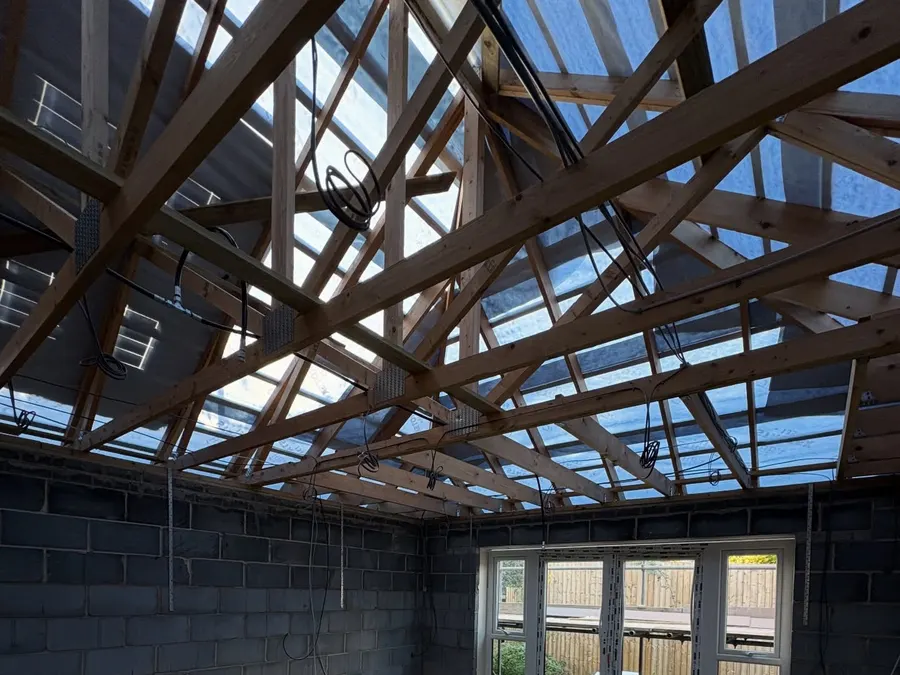 First-fix cabling run through the roof trusses of a new build