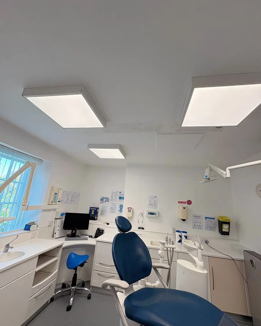 Dental surgery room lit by new recessed LED ceiling panels